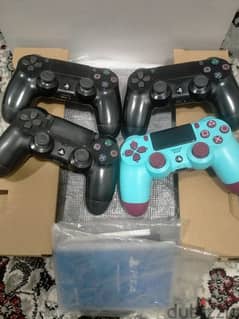 PS4 Slim 1TB + 4 controllers + 5 games