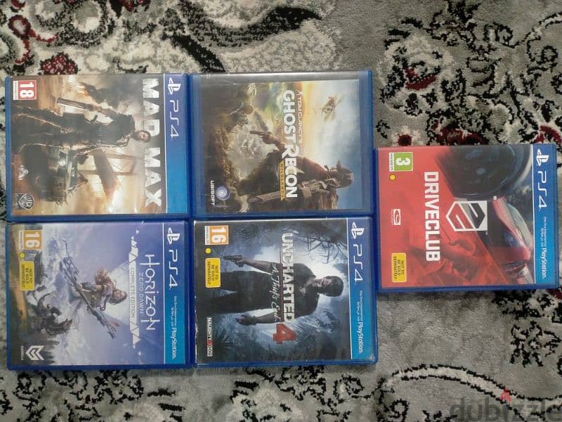 PS4 Slim 1TB + 4 controllers + 5 games 1