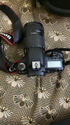 canon 7D body with  18*135mm lens 0