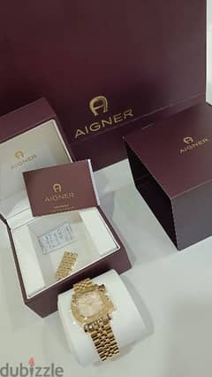 brand new gold Aigner watch