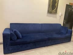 sofa set with curtain and center table
