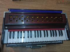 unbox harmonium with coupler with 9 keys double reed in good condition