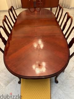 Pure wood dining table set in great condition comes with 8 chairs!