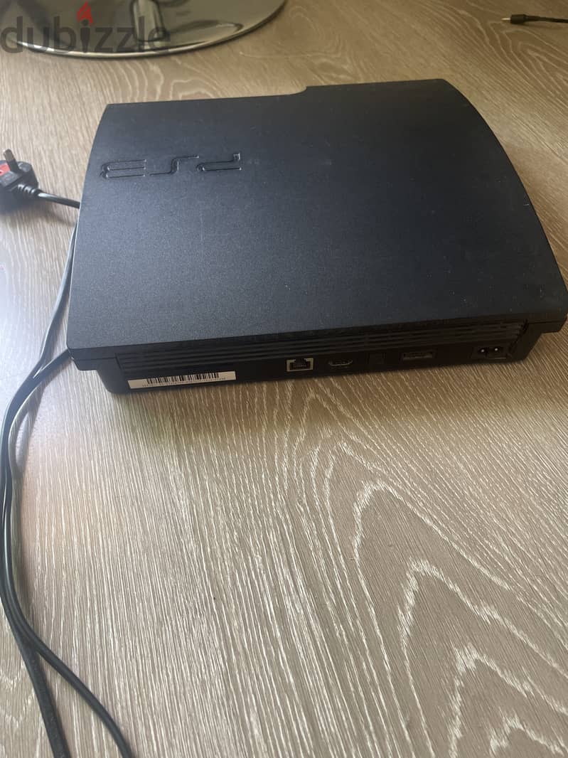 PlayStation 3 with power cable 2