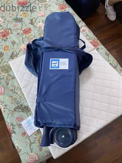 Portable cot from mothercare