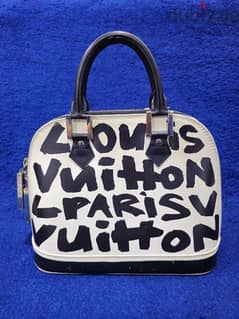 RARE AND LIMITED EDITION LOUIS VUITTON ALMA STEPHEN SPROUSE BAG 0