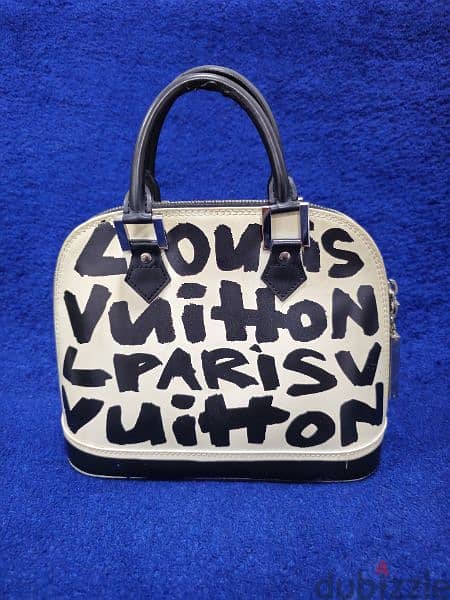RARE AND LIMITED EDITION LOUIS VUITTON ALMA STEPHEN SPROUSE BAG 1