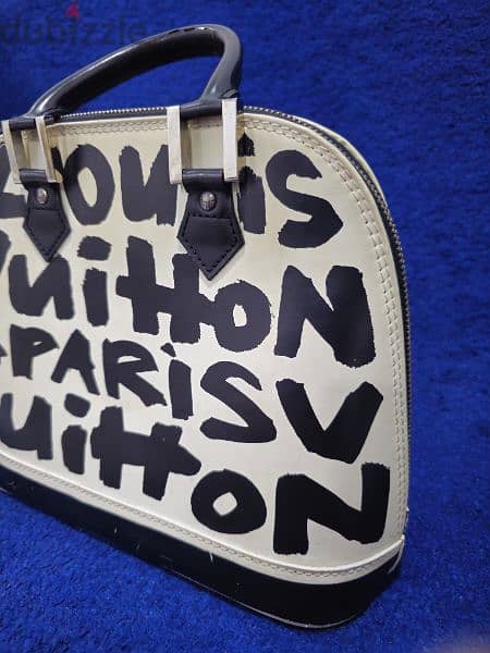 RARE AND LIMITED EDITION LOUIS VUITTON ALMA STEPHEN SPROUSE BAG 17