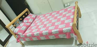 Bed with mattress.