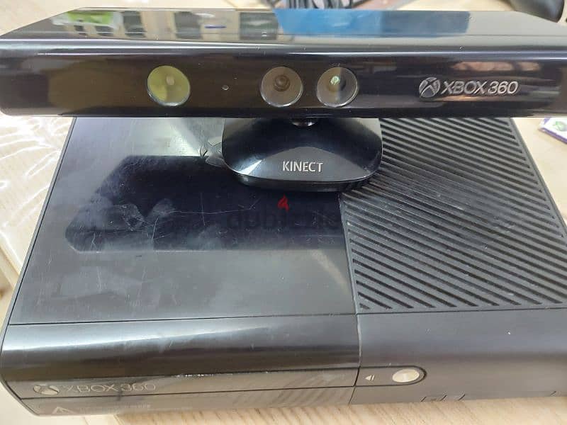xbox 360 used with 7 games cd 1
