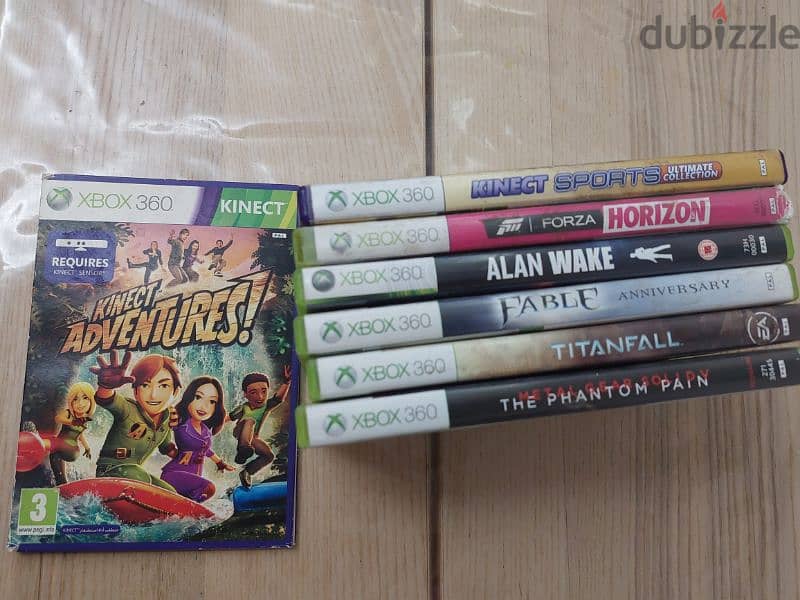 xbox 360 used with 7 games cd 4