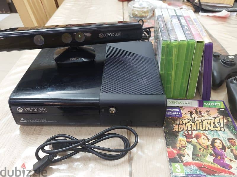 xbox 360 used with 7 games cd 6