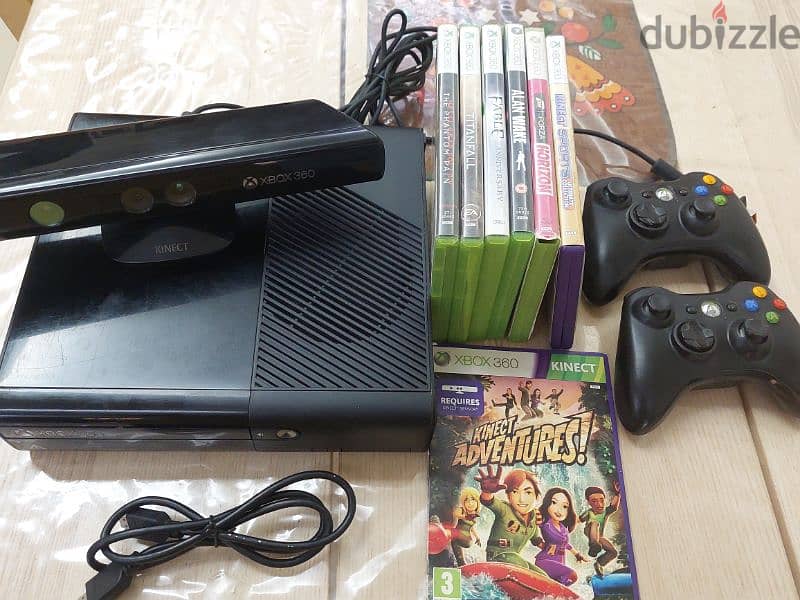xbox 360 used with 7 games cd 7