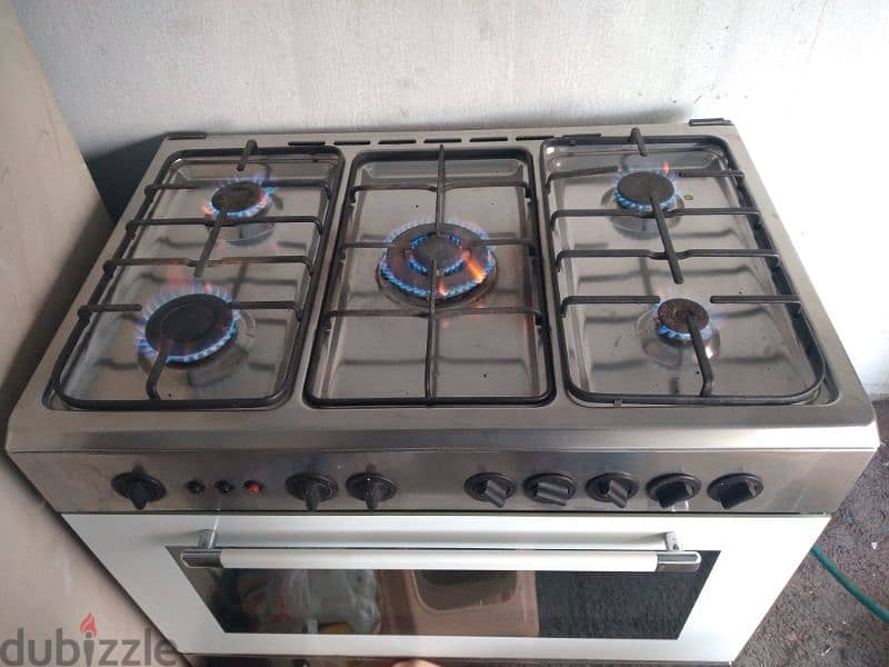 cooking range 5 burner there is no top glass 1