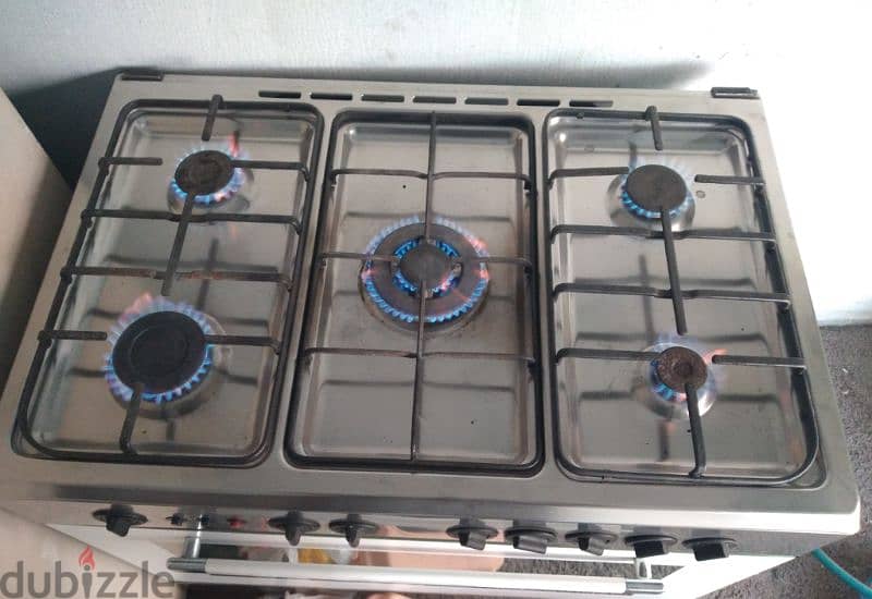 cooking range 5 burner there is no top glass 2