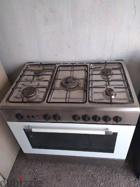 cooking range 5 burner there is no top glass 3