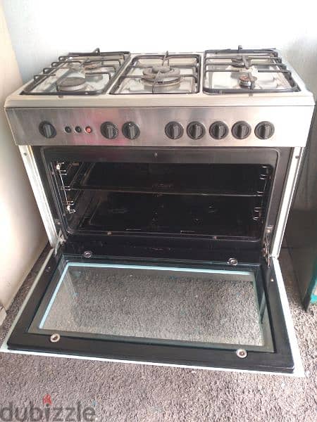 cooking range 5 burner there is no top glass 4