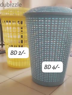 Plastic laundry basket with lid