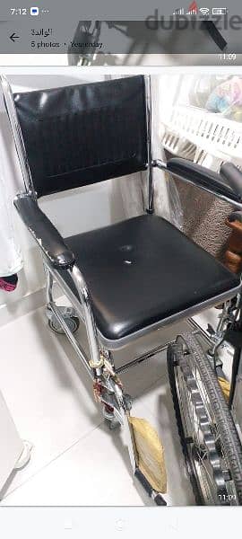 one wheel chair and two bathroom wheel chairs 2