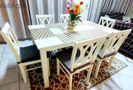 Home center dining table with 6 chairs.  Almost new. 0
