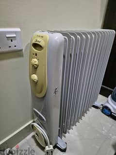Water Dispensor & Room Oil Heater 0
