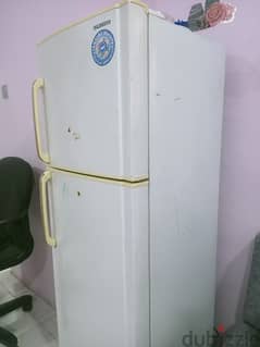 old fridge in working condition. . but need servicing