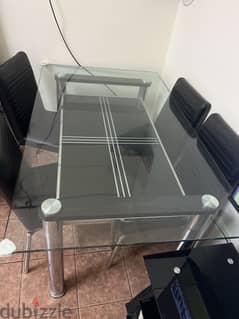Glass dinning table with 6 chairs 0