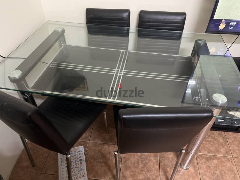 Glass dinning table with 6 chairs 1