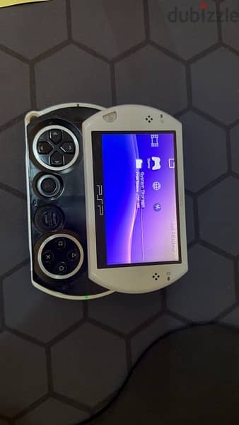 PSP Go, white and black, 16gb with 20 games 6.61 version 4