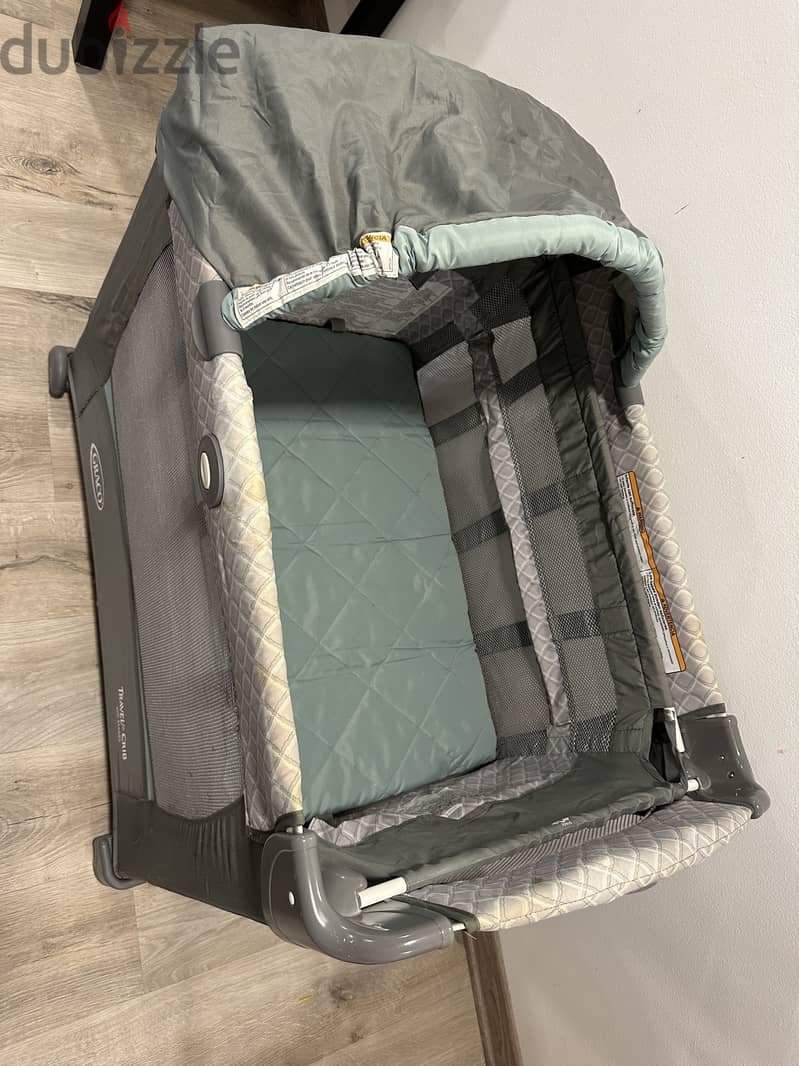 Graco Travel Crib with 2 stages, little used, grey/aquamarine color 2