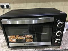 Olsenmark Grill Oven 18 BD ONLY in new condition Call 38862647