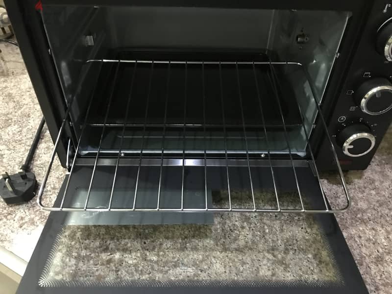 Olsenmark Grill Oven 18 BD ONLY in new condition Call 38862647 1