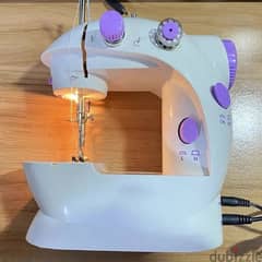 MINI SEWING MACHINE WITH LIGHT CUTTER FOOT PEDAL 0