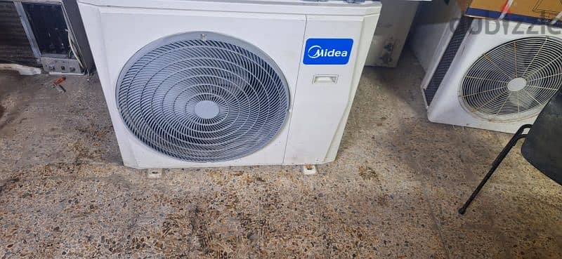 midea ac 2.5 ton spilt good condition good working with fixing with wa 1