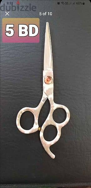 Beauty items . saloon scissors are available for sale . 2