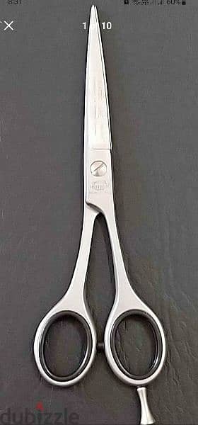 Beauty items . saloon scissors are available for sale . 4