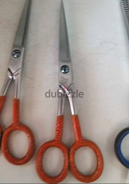 Beauty items . saloon scissors are available for sale . 5