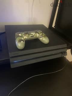 Sony PlayStation 4 with controller and games