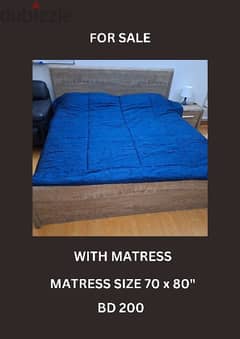 king-size bed with mattress and side table