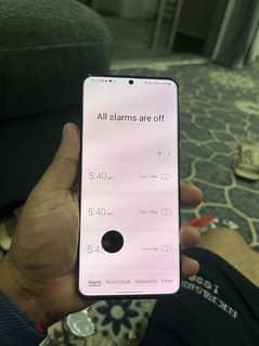 Samsung is 20 ultra 128 GB 12 GB only  small black dot line scree