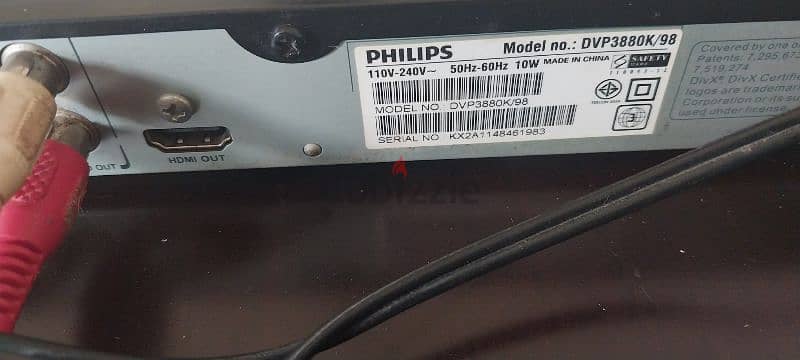 Philips DVD Player with remote control, cables, and manual. 5