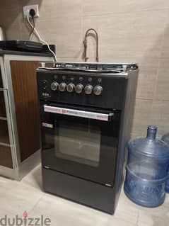 Gas burner with in-built oven