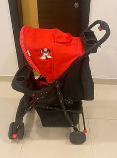 Stroller (Disney Mini) and Car Seat (Juniors) from Mothercare