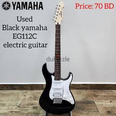 Used Black yamaha EG112C electric guitar. 0