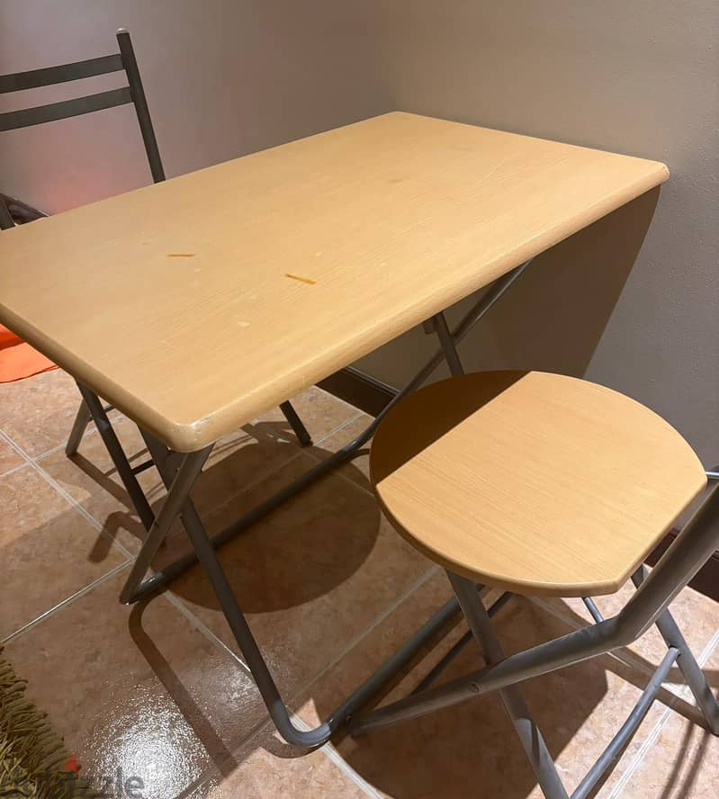 Foldable table wit two foldable chairs 1