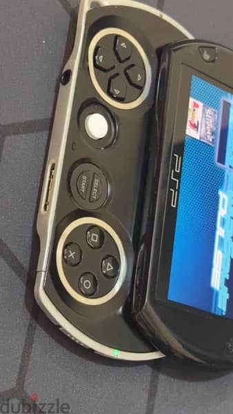 PSP GO ,16 gb charger with 20 games 2