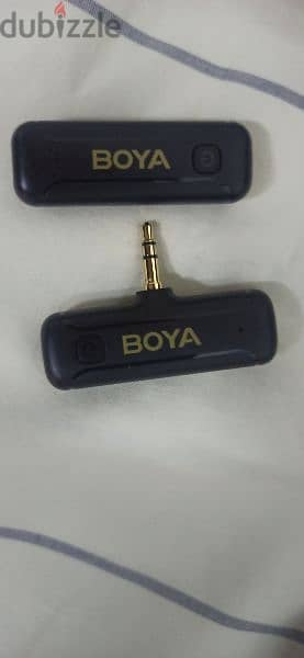 Boya/K35 Wireless Mic and Insta 360. x3. Battrey charger. 1