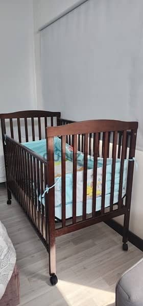 Juniors baby cot with mattress and bumper for immediate sale 1