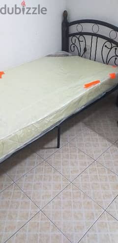 Very clean bed with almost new mattress