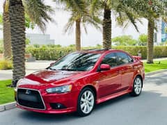 MITSUBISHI LANCER GT 2014 FULLY LOADED MODL CAL OR WHATSAP ON 33239169